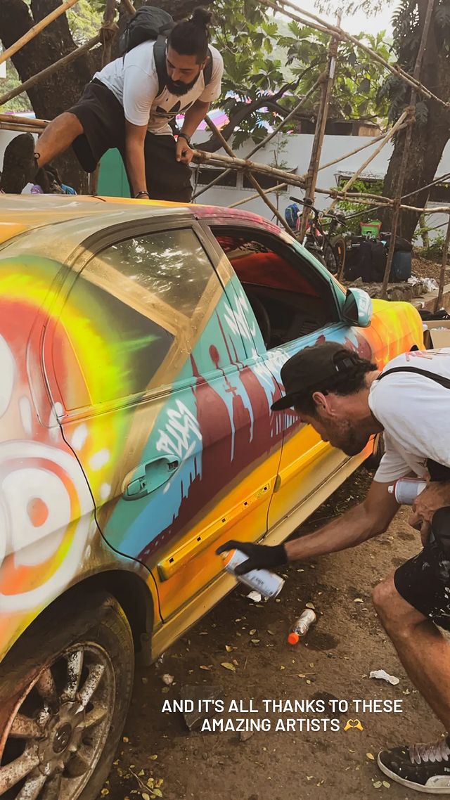 Street Art Project — graffiti artists painting a car